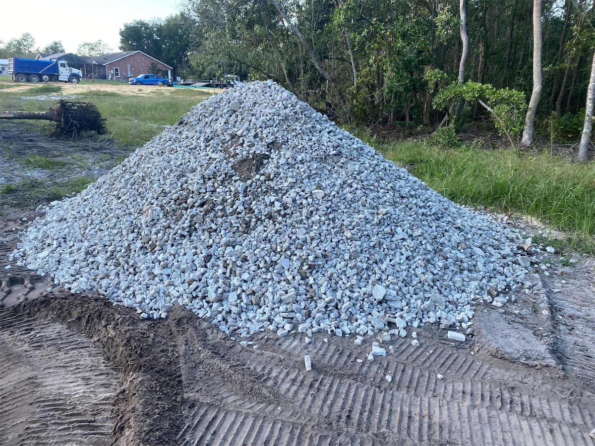 medium sized stockpile of crushed concrete on a job site