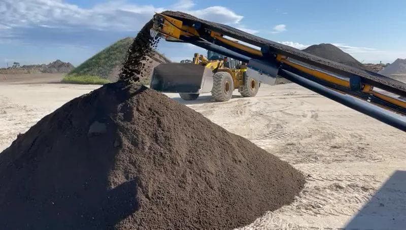 topsoil being screened and stockpiled