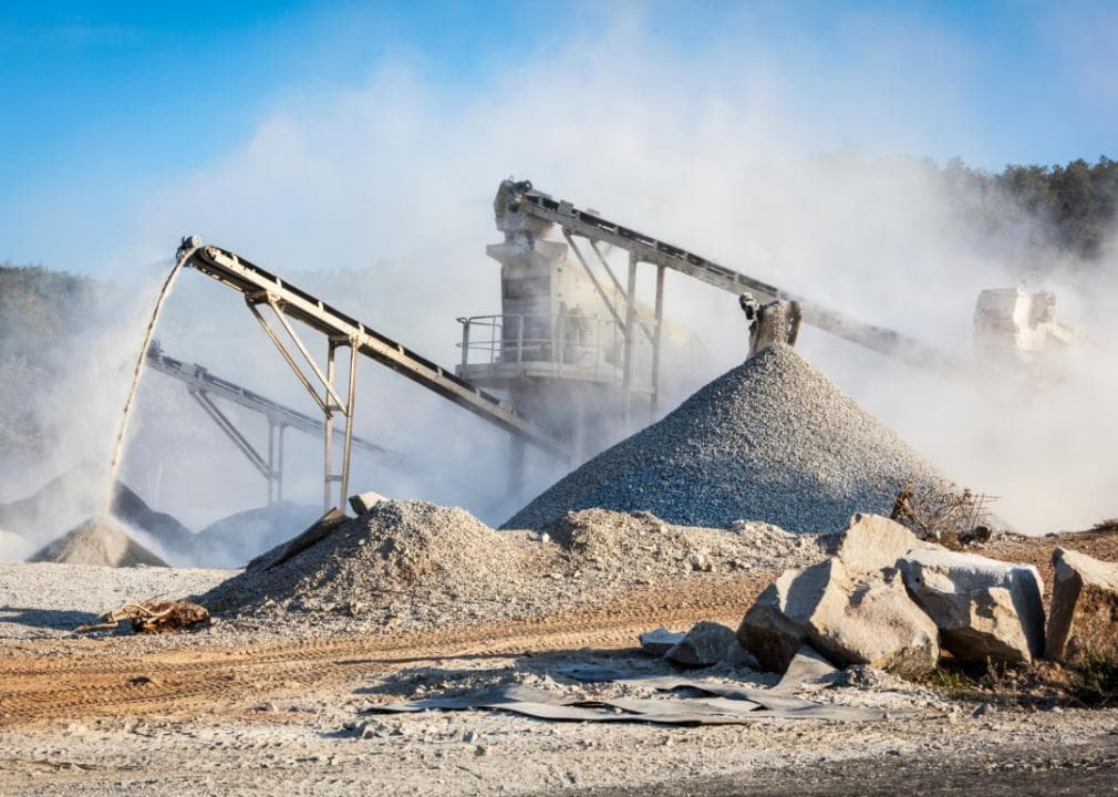 Machines moving stone at a quarry