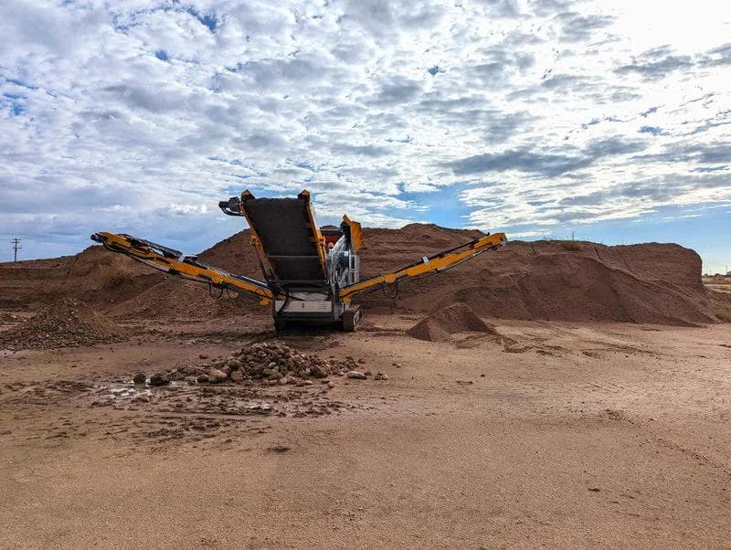 Barford SR124 scalping screen sorting rock into 3 stockpiles