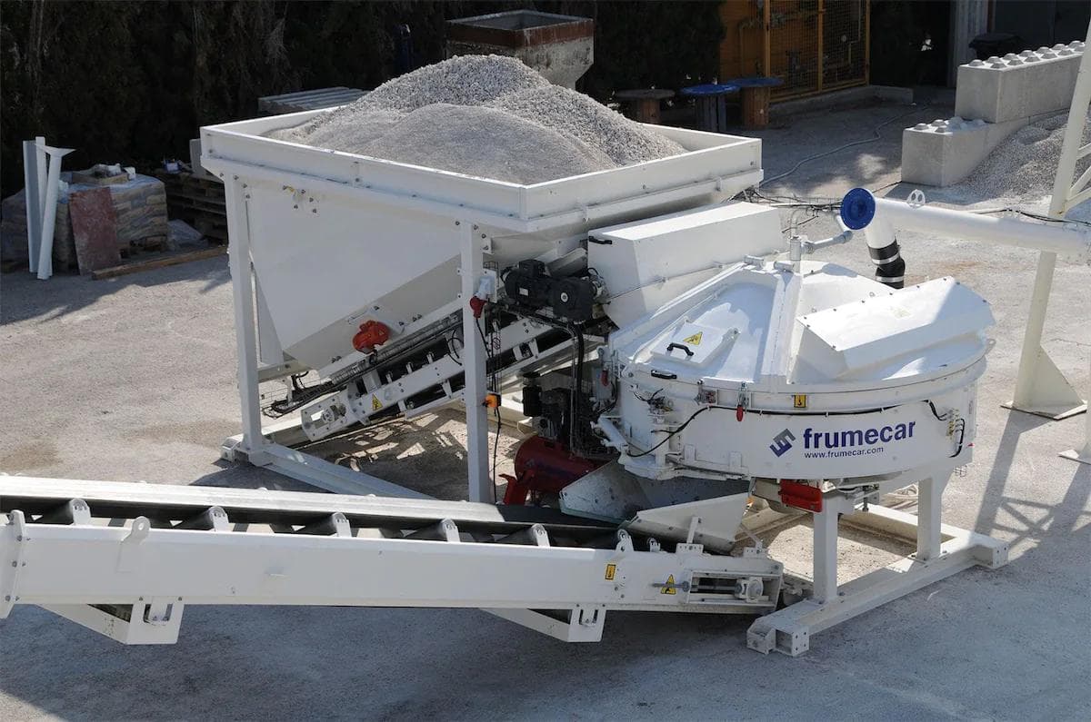 Frumecar concrete batch plant making concrete with silos full of aggregate