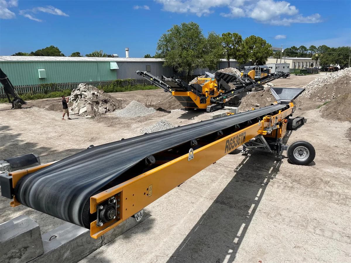 yellow barford R6536TR radial convey being fed by an ark kompatto 5030 3-way screener