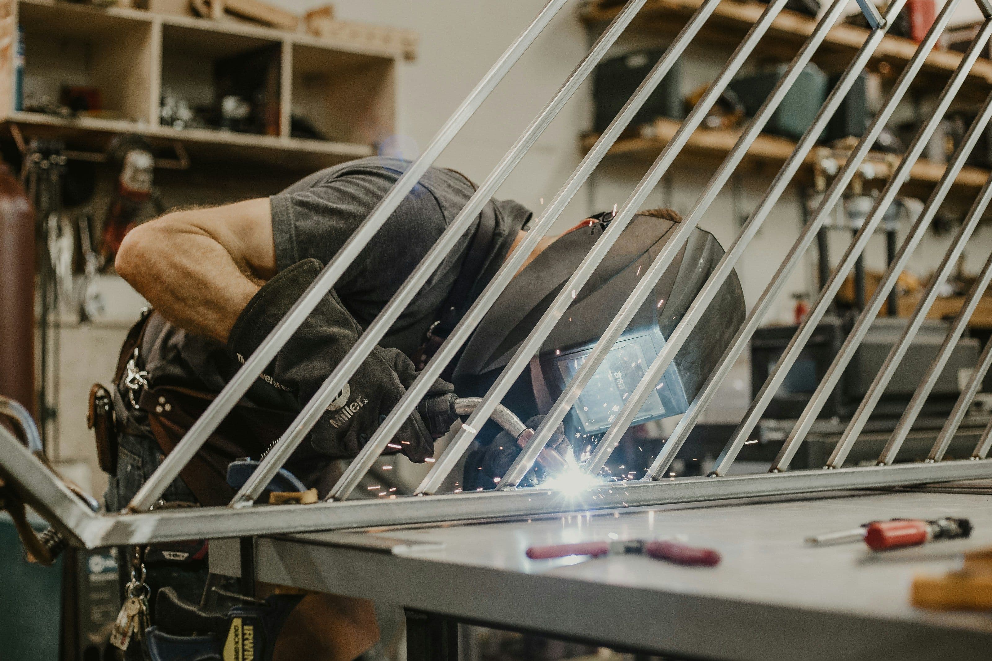welder welding a metal frame