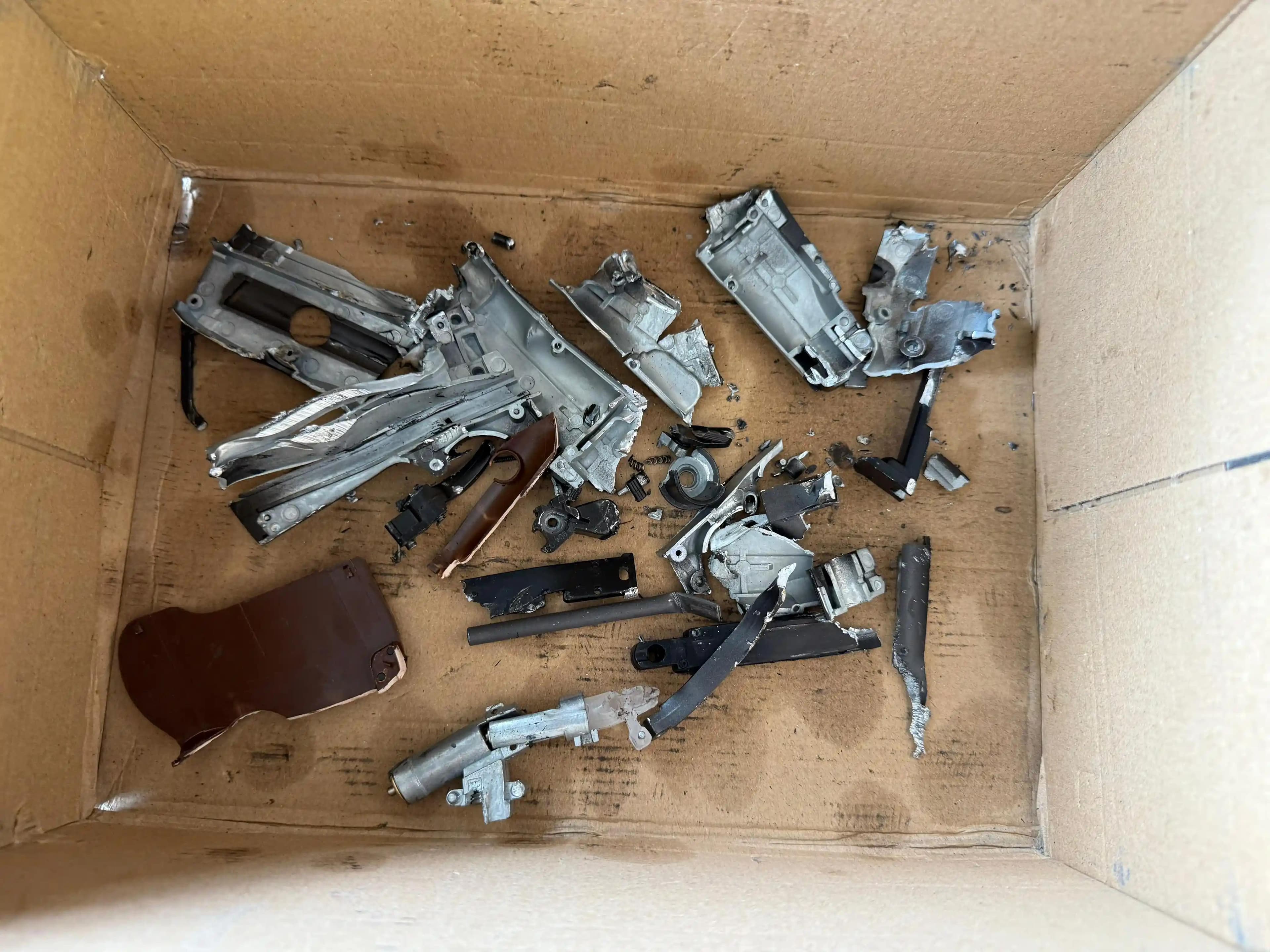 Decommissioned firearms after shredding by the olnova model 5 gun shredder