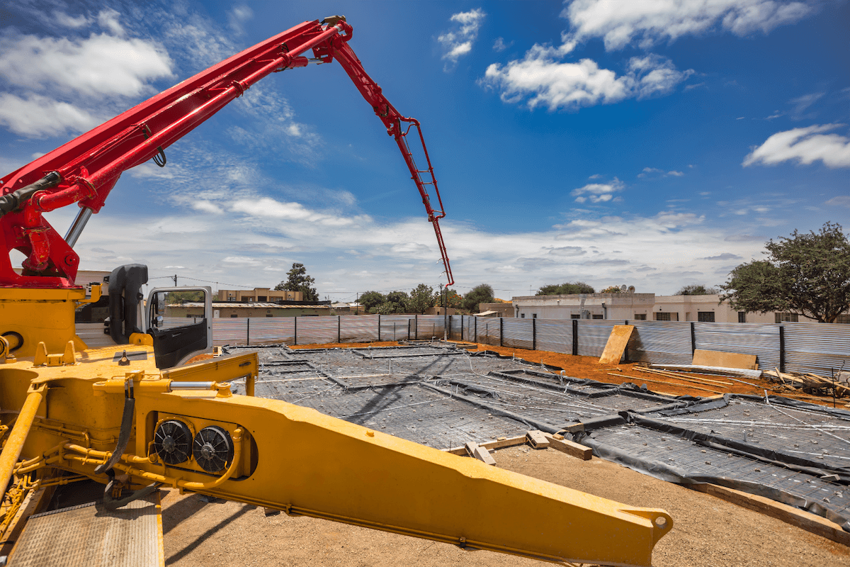 concrete pump, pouring concrete at a large project site