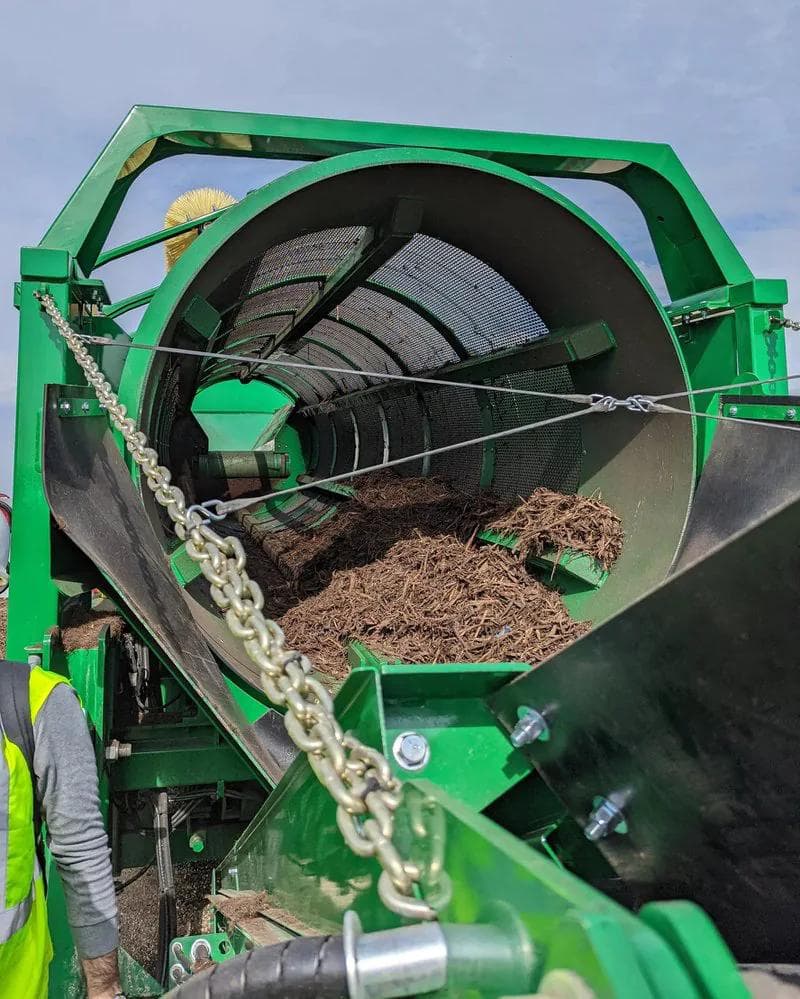 large green trommel screening wood cips