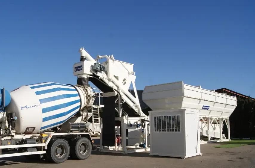 Concrete batch plant from frumecar filling up a ready mix truck