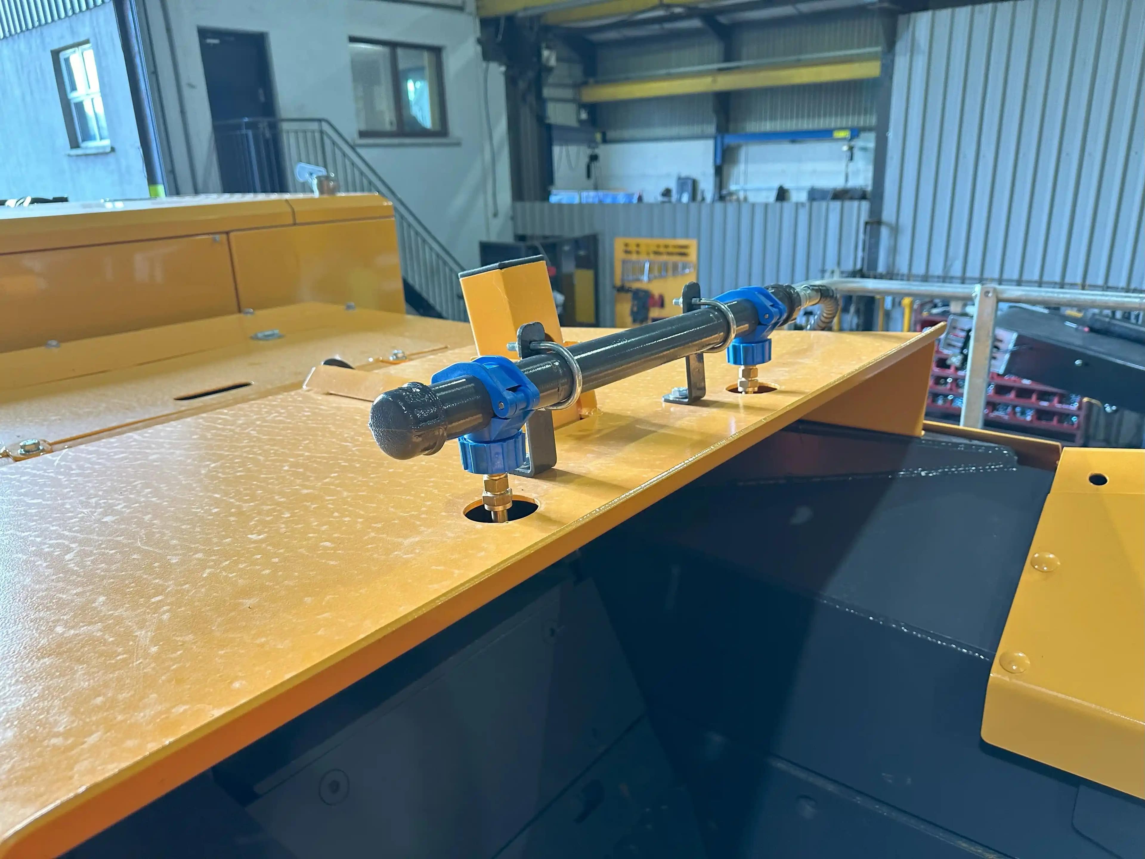 water spray bars on top of the jaw box of a Barford 750j rs jaw crusher