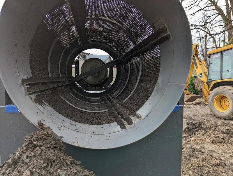 trommel screening topsoil and soil with wire mesh