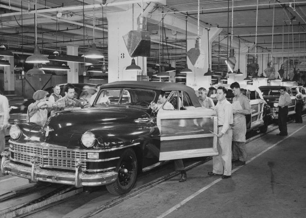 Automobile workers on the production line at the Chrysler Assembly Plant in Detroit