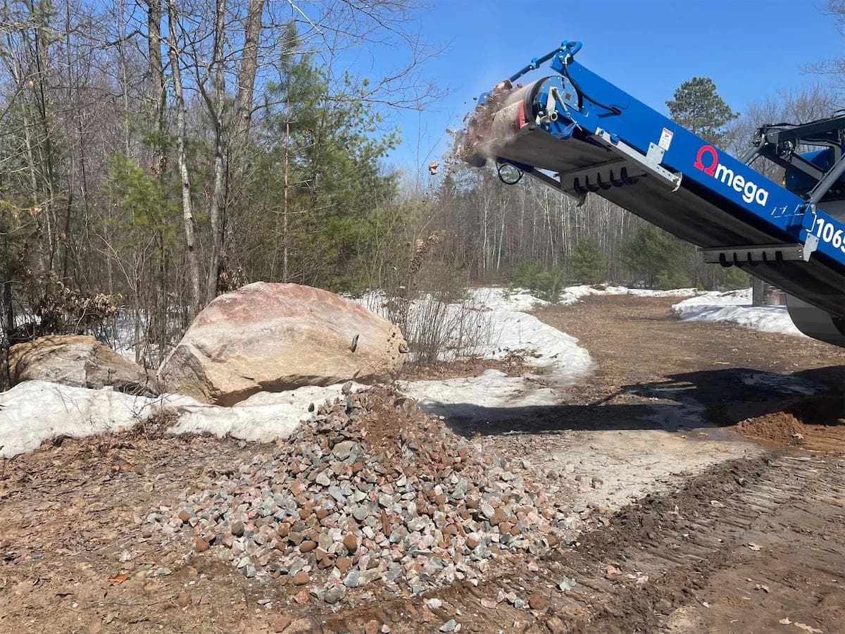 Crushing virgin rock with the Omega J1065T tracked mobile jaw crusher