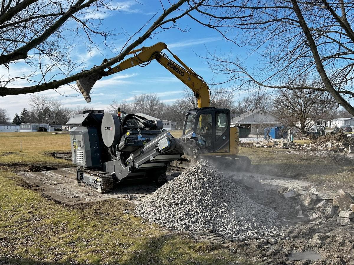 ark jaw crusher crushing concrete on a job site